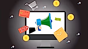 Bilgisayar ekranından çıkan megafonla çevrili kredi kartı, indirim etiketi ve alışveriş simgeleri, dijital pazarlama ve e-ticaretin etkisini temsil ediyor.